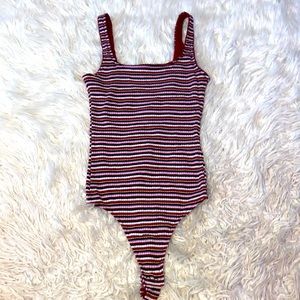 Body suit super stretchy and very comfortable.